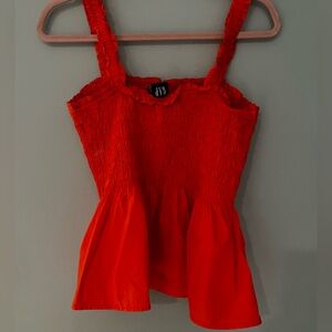 Orange Smocked Peplum Top